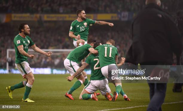 Dublin , Ireland - 14 November 2017; Shane Duffy, centre, of Republic of Ireland celebrates with team-mates after scoring his side's first goal...