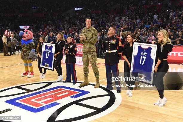 Marshall Plumlee helps honor our countrys veterans before the game against the Philadelphia 76ers November 13, 2017 at STAPLES Center in Los Angeles,...