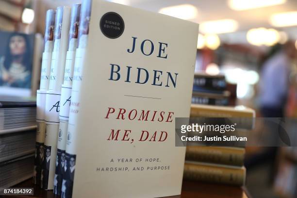 Copies of the new book by former U.S. Vice president Joe Biden called 'Promise Me, Dad' are displayed on a shelf at Book Passage on November 14, 2017...