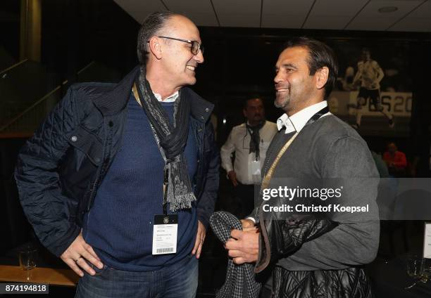 Juergen Kohler and Ulf Kirsten talk during the Club Of Former National Players Meeting at RheinEnergieStadion on November 14, 2017 in Cologne,...