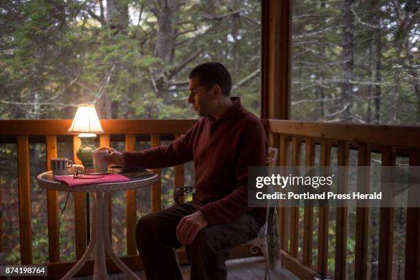 Mark Elwin sips coffee on his screened-in porch at his home. Elwin tested positive for anaplasmosis in 2015, was hospitalized, and he said he's been...