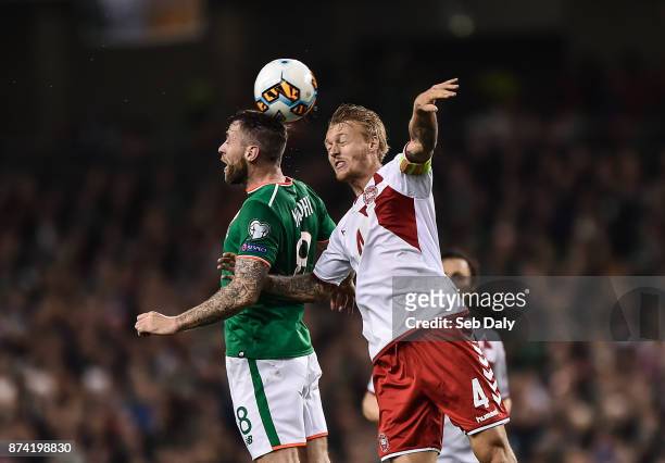 Dublin , Ireland - 14 November 2017; Daryl Murphy of Republic of Ireland in action against Simon Kjær of Denmark during the FIFA 2018 World Cup...