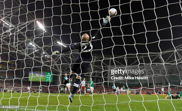 Christian Eriksen of Denmark scores his sides second goal past Darren Randolph of the Republic of Ireland during the FIFA 2018 World Cup Qualifier...