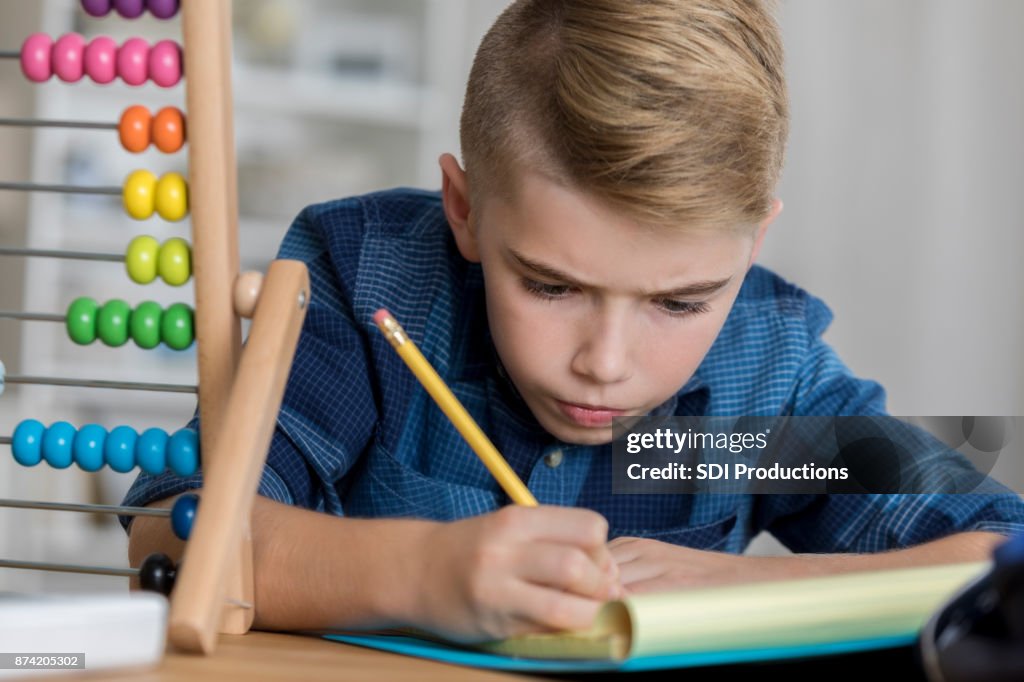 Middle School Student Works On Math Assignment High-Res Stock Photo ...
