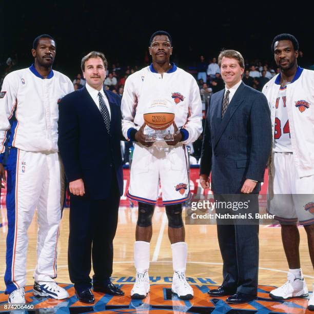 Patrick Ewing of the New York Knicks is recognized after scoring his 20,000th point during a game played on November 24, 1996 at Madison Square...