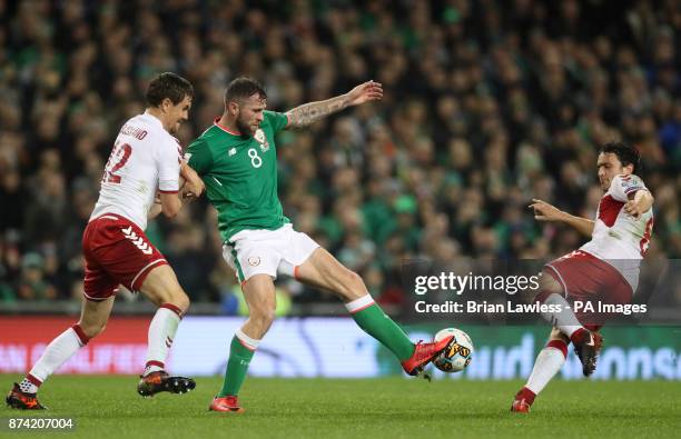 Republic of Ireland's Daryl Murphy and Denmark's Andreas Bjelland and Thomas Delaney battle for the ball during the 2018 FIFA World Cup qualifying...