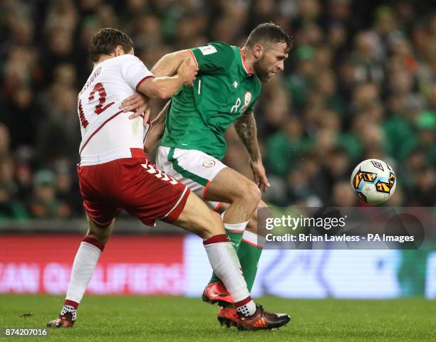 Republic of Ireland's Daryl Murphy and Denmark's Andreas Bjelland battle for the ball during the 2018 FIFA World Cup qualifying play-off second leg...