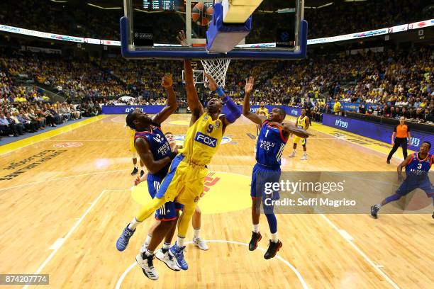 Alex Tyus, #9 of Maccabi Fox Tel Aviv competes with Bryant Dunston, #42 of Anadolu Efes Istanbul during the 2017/2018 Turkish Airlines EuroLeague...