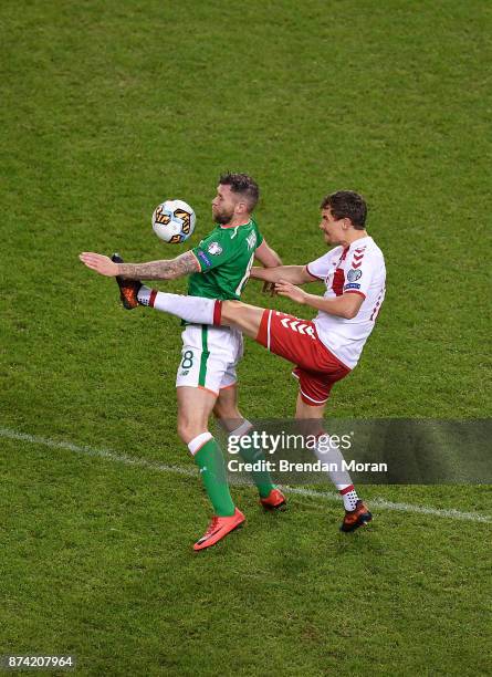 Dublin , Ireland - 14 November 2017; Daryl Murphy of Republic of Ireland in action against Andreas Bjelland of Denmark during the FIFA 2018 World Cup...