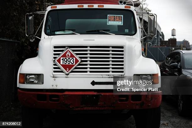 Truck sits for sale in a yard on November 14, 2017 in New York City. According to a new report by the International Energy Agency, global oil demand...