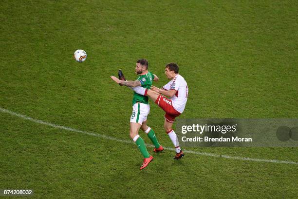 Dublin , Ireland - 14 November 2017; Daryl Murphy of Republic of Ireland in action against Andreas Bjelland of Denmark during the FIFA 2018 World Cup...