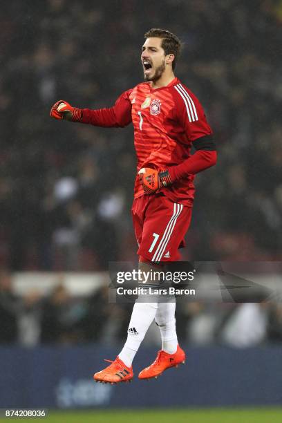 Kevin Trapp of Germany celebrates his sides first goal during the international friendly match between Germany and France at RheinEnergieStadion on...