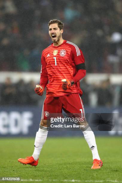 Kevin Trapp of Germany celebrates his sides first goal during the international friendly match between Germany and France at RheinEnergieStadion on...