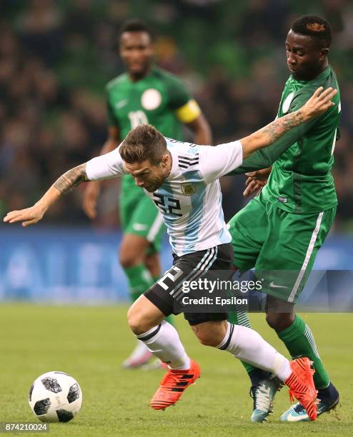 Alejandro Gomez of Argentina fights for the ball with Wilfred Ndidi of Nigeria during an international friendly match between Argentina and Nigeria...