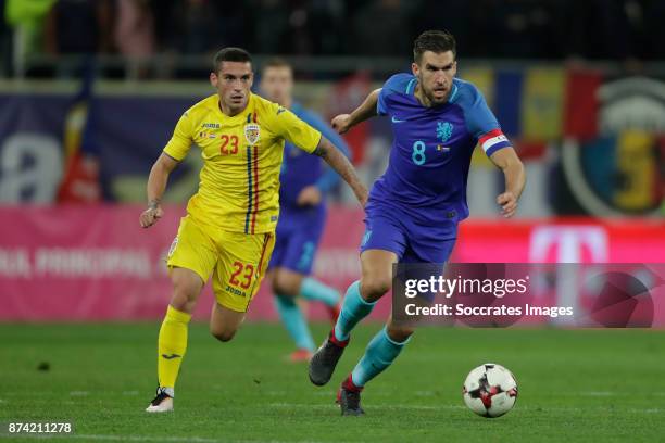 Nicolae Stanciu of Romania, Kevin Strootman of Holland during the International Friendly match between Romania v Holland at the Arena Nationala on...