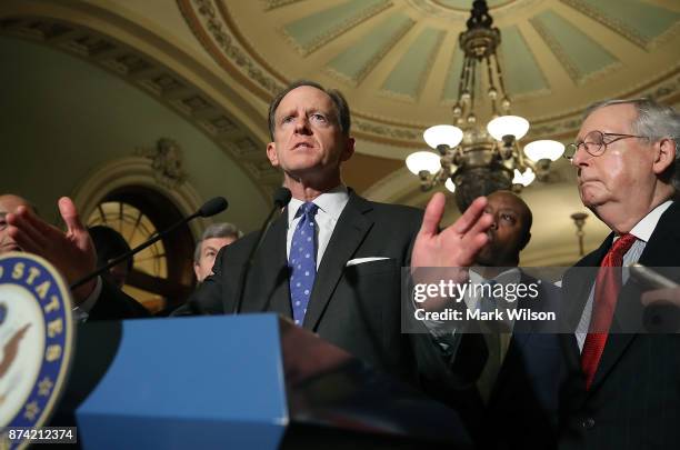 Sen. Pat Toomey speaks to reporters about the proposed Senate Republican tax bill, after attending the Senate GOP policy luncheon, at US Capitol on...