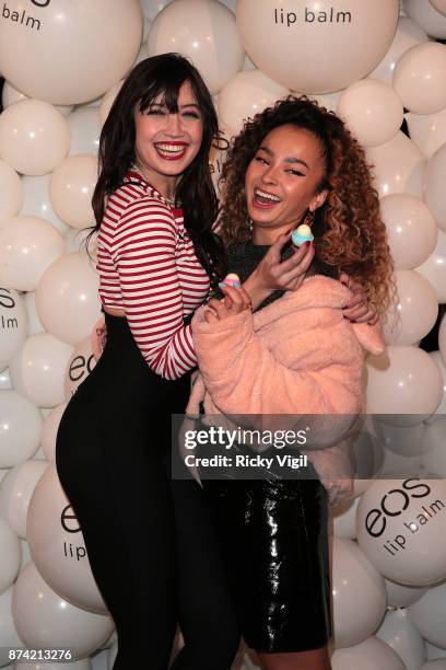 Daisy Lowe and Ella Eyre attend the 'EOS Lip Balm Winter Lips' party at Jimmy's Lodge Pop up on November 14, 2017 in London, England.