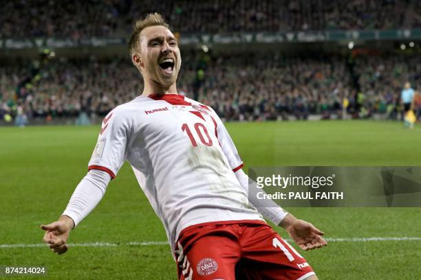 Denmark's midfielder Christian Eriksen celebrates after scoring their third goal during the FIFA World Cup 2018 qualifying football match, second...
