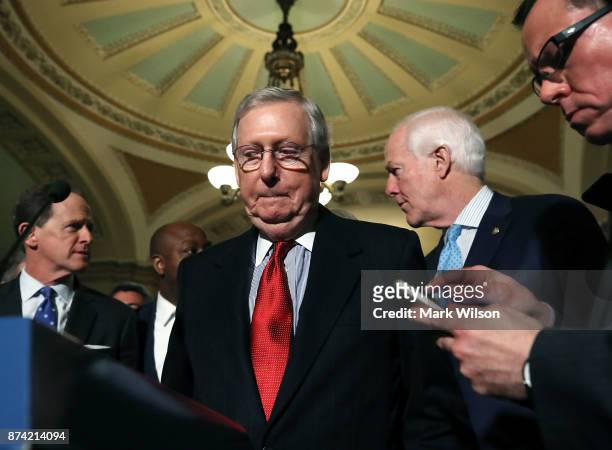 Senate Majority Leader Mitch McConnell , speaks to reporters about the proposed Senate Republican tax bill, after attending the Senate GOP policy...