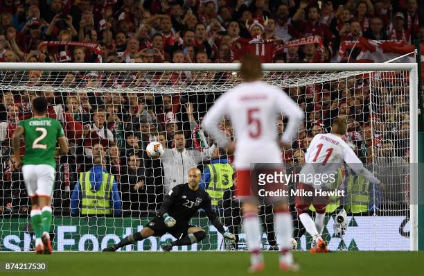 Nicklas Bendtner of Denmark scores his sides fifth goal from the penalty spot past Darren Randolph of the Republic of Ireland during the FIFA 2018...