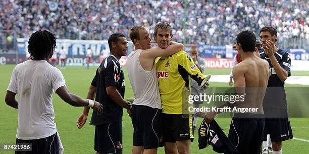 Goal keeper Thomas Kessler of Koeln and his team mates celebrate after winning the Bundesliga match between Hamburger SV and 1. FC Koeln at HSH...