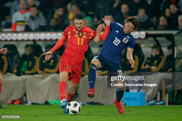 Kevin Mirallas of Belgium, Takuma Asano of Japan during the International Friendly match between Belgium v Japan at the Jan Breydel Stadium on...