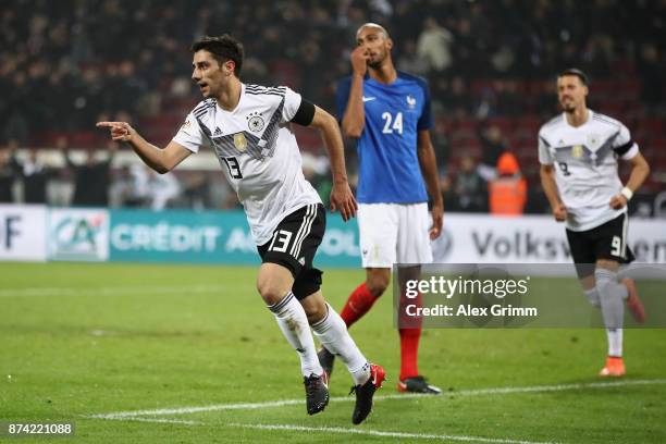 Lars Stindl of Germany celebrates scoring his sides second goal during the international friendly match between Germany and France at...