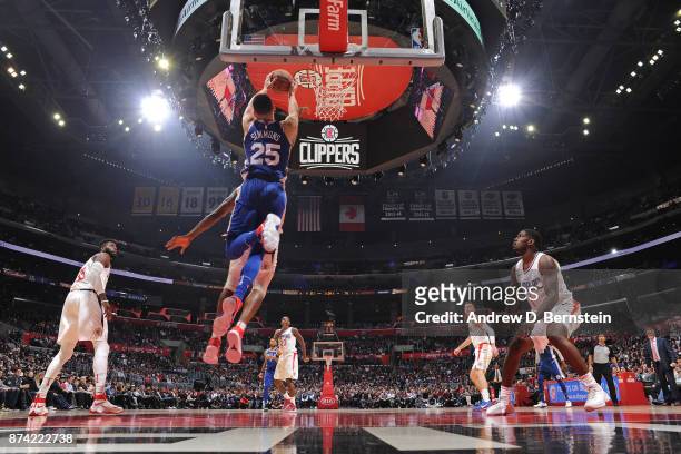 Ben Simmons of the Philadelphia 76ers catches an alley-opp for a dunk against the LA Clippers on November 13, 2017 at STAPLES Center in Los Angeles,...