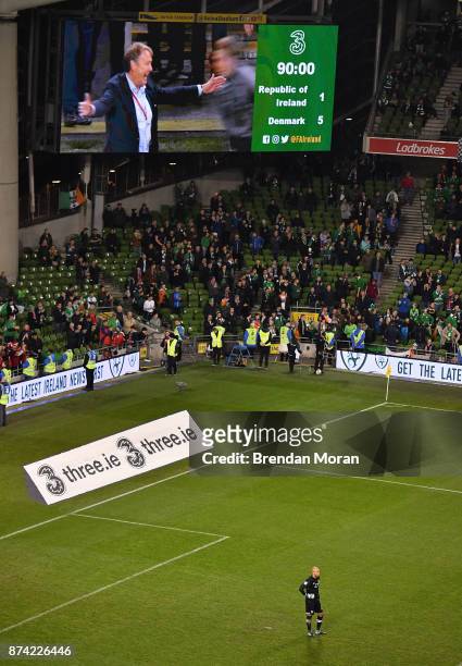 Dublin , Ireland - 14 November 2017; A dejected Darren Randolph of Republic of Ireland as Denmark manager Aage Hareide celebrates at the final...