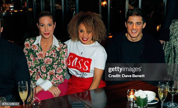 Laura Pradelska, Pandora Christie and Pietro Boselli attend the unveiling of 'The Tree of Glass' by Lee Broom with Nude at Aqua Shard on November 14,...