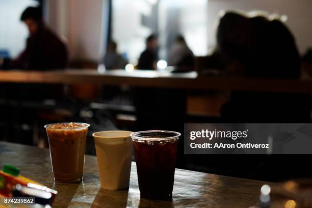 From left to right are an iced late, an Americano and an iced coffee at Thump Coffee on Monday, November 12, 2017.