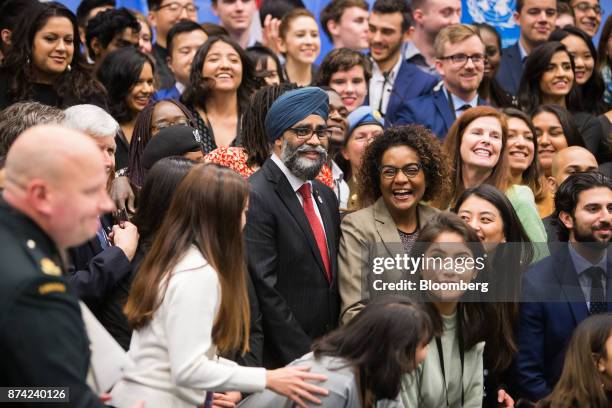 Harjit Sajjan, Canada's defense minister, center left, and Michaelle Jean, secretary-general of Organisation Internationale de la Francophonie,...