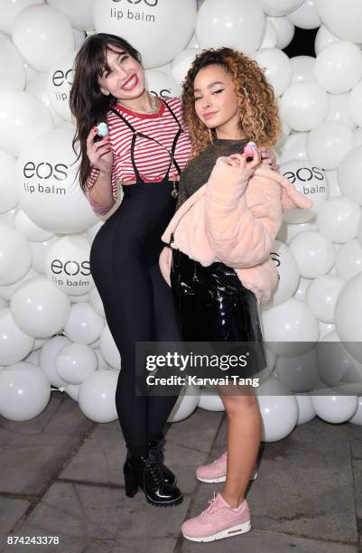 Daisy Lowe and Ella Eyre attend the 'EOS Lip Balm Winter Lips' party at Jimmy's Lodge Pop up on November 14, 2017 in London, England.