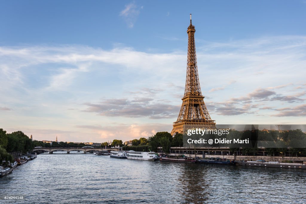 Sunset over the famous Eiffel tower in Paris, France
