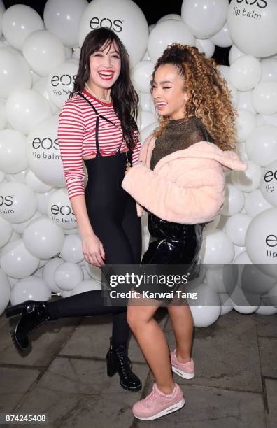 Daisy Lowe and Ella Eyre attend the 'EOS Lip Balm Winter Lips' party at Jimmy's Lodge Pop up on November 14, 2017 in London, England.