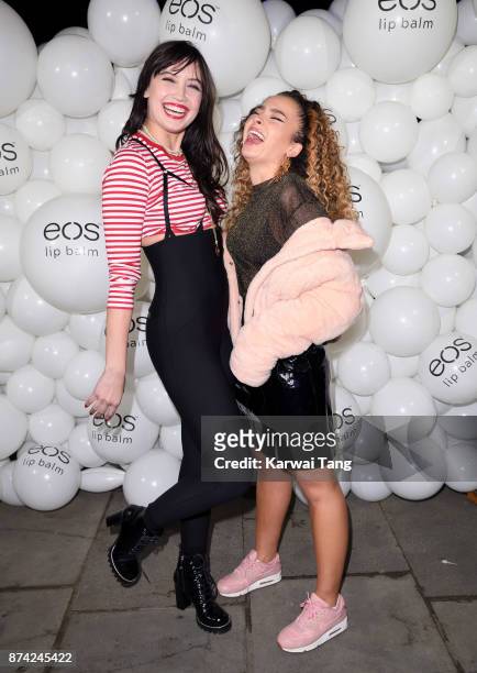Daisy Lowe and Ella Eyre attend the 'EOS Lip Balm Winter Lips' party at Jimmy's Lodge Pop up on November 14, 2017 in London, England.