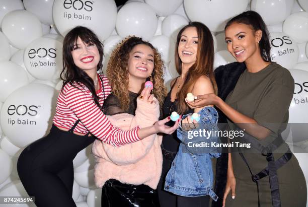 Daisy Lowe, Ella Eyre; Danielle Peazer and Maya Jama attend the 'EOS Lip Balm Winter Lips' party at Jimmy's Lodge Pop up on November 14, 2017 in...