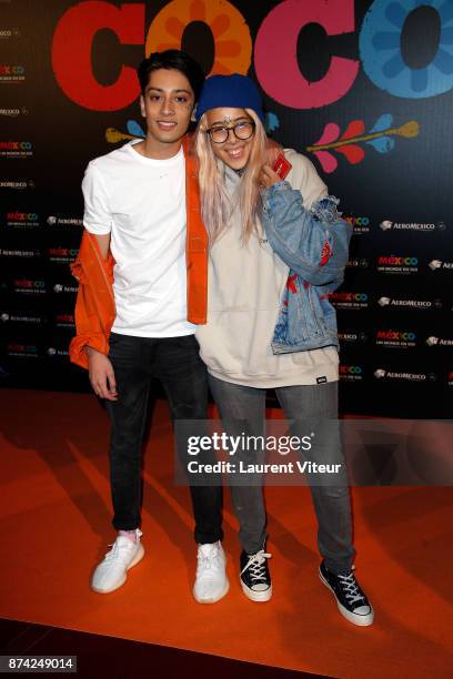 Sparkdise and a guest attend "Coco" Special Screening at Le Grand Rex on November 14, 2017 in Paris, France.