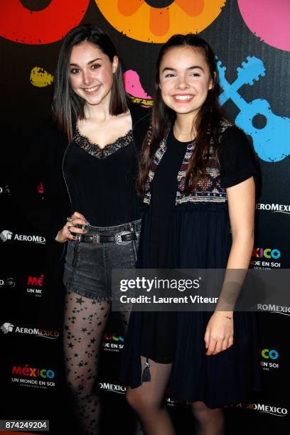 Chloe Stafler and a guest attend "Coco" Special Screening at Le Grand Rex on November 14, 2017 in Paris, France.