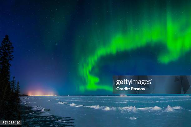aurora over minnesota north shore - minnesota snow stock pictures, royalty-free photos & images
