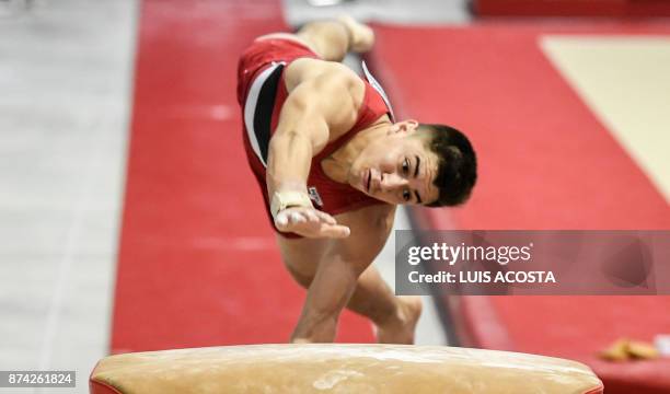 Guatemalan gymnast Jorge Vega performs on the vault in the artistic gymnastics men's individual event, during the XVIII Bolivarian Games 2017 in...