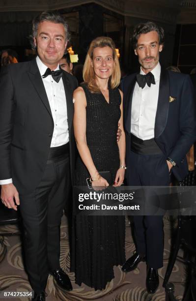 Laurent Feniou, Carine Feniou and Richard Biedul attend The Cartier Racing Awards 2017 at The Dorchester on November 14, 2017 in London, England.