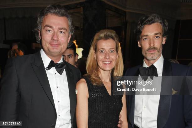 Laurent Feniou, Carine Feniou and Richard Biedul attend The Cartier Racing Awards 2017 at The Dorchester on November 14, 2017 in London, England.