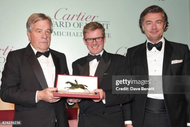 Award of Merit winner Sir Michael Stoute, Marcus Armytage and Laurent Feniou attend The Cartier Racing Awards 2017 at The Dorchester on November 14,...