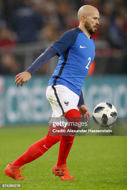 Christophe Jallet of France runs with the ball during the international friendly match between Germany and France at RheinEnergieStadion on November...