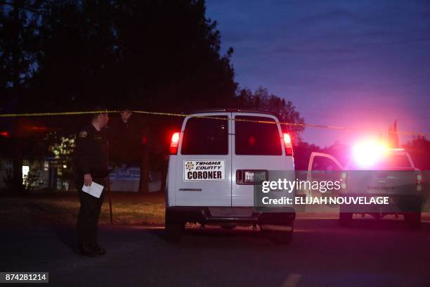 Tehama County Coroner's van enters the Rancho Tehama Elementary school grounds after a shooting on November 14 in Rancho Tehama, California. Four...