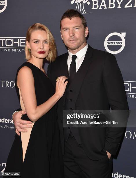 Model Lara Bingle and actor Sam Worthington attend the 2017 Baby2Baby Gala at 3LABS on November 11, 2017 in Culver City, California.