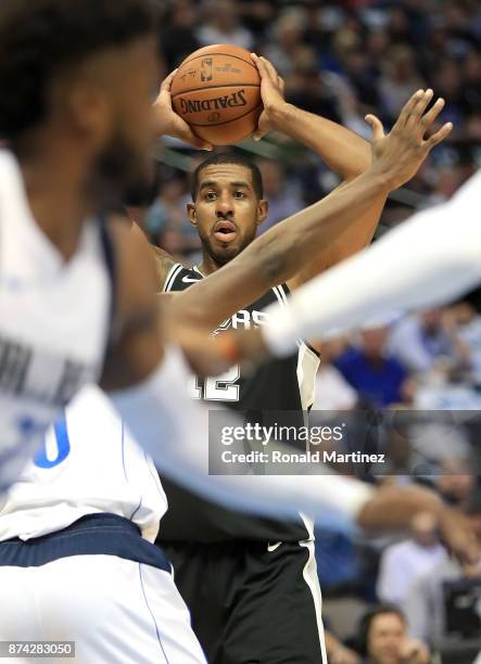 LaMarcus Aldridge of the San Antonio Spurs looks to pass against the Dallas Mavericks in the first half at American Airlines Center on November 14,...