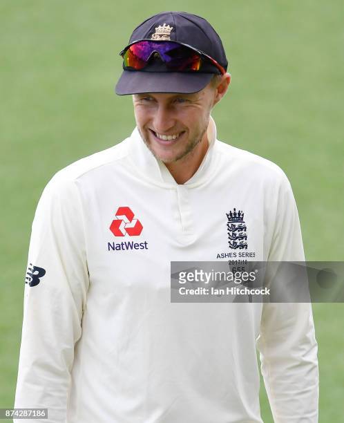 Joe Root of England has a laugh before the start of the four day tour match between Cricket Australia XI and England at Tony Ireland Stadium on...