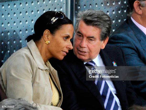 Manolo Santana and girlfriend Claudia attend Madrid Open tennis tournament at La Caja Magica on May 15, 2009 in Madrid, Spain.